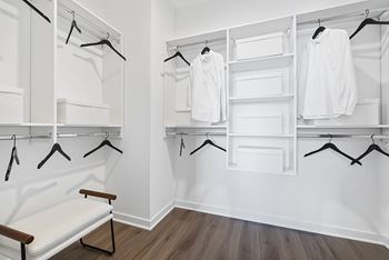 Expansive closet designed with modular storage solutions